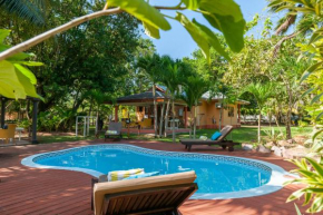 Гостиница Villas des Alizes beachfront suites and garden villas  Гран Анс
